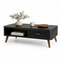 Table basse rectangulaire en bois et métal noir avec tiroir, niche ouverte et pieds bruns, 110 × 55 × 45 cm